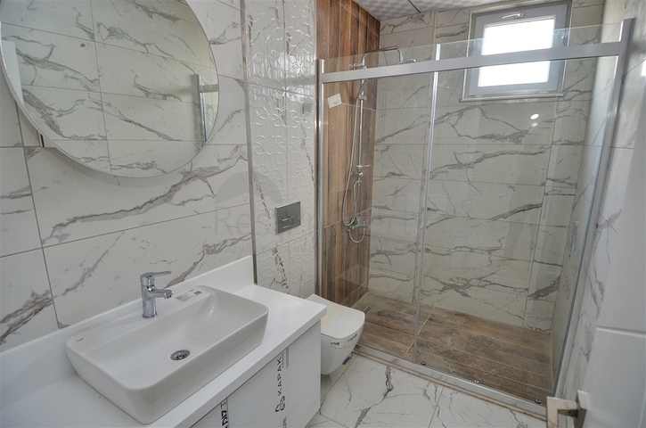 A building with 4 apartments in the area of Doshemealti - Antalya 