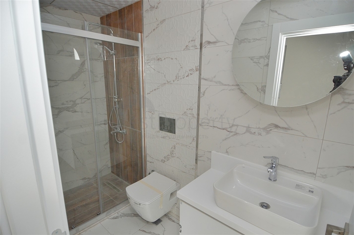 A building with 4 apartments in the area of Doshemealti - Antalya 