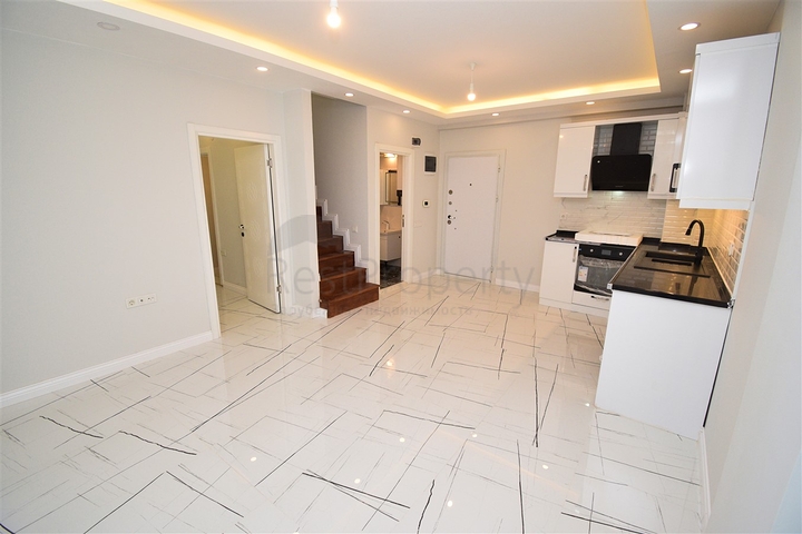 A 3+1 apartment in the Persimmon - Antalya neighborhood 