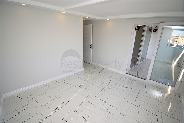 A 3+1 apartment in the Persimmon - Antalya neighborhood 