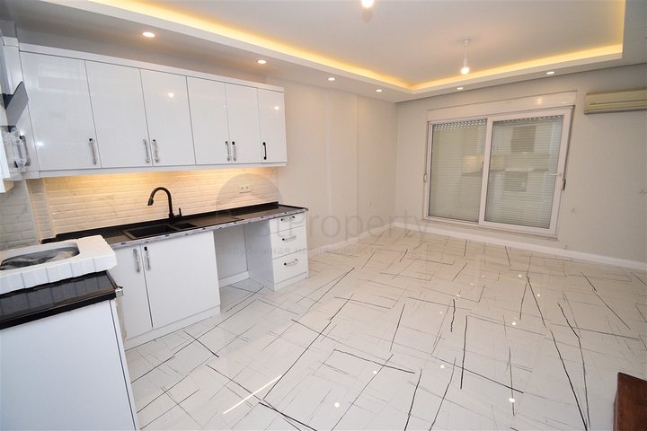 A 3+1 apartment in the Persimmon - Antalya neighborhood 