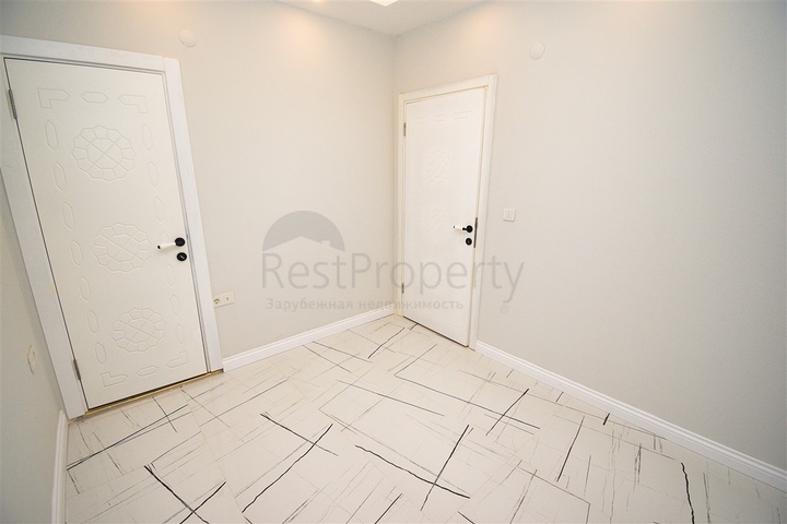 A 3+1 apartment in the Persimmon - Antalya neighborhood 