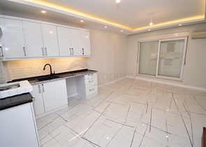 A 3+1 apartment in the Persimmon - Antalya neighborhood 