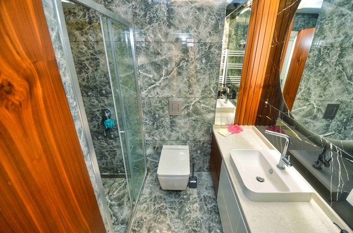 Spacious 4+1 apartment in Uncali - Antalya neighborhood 