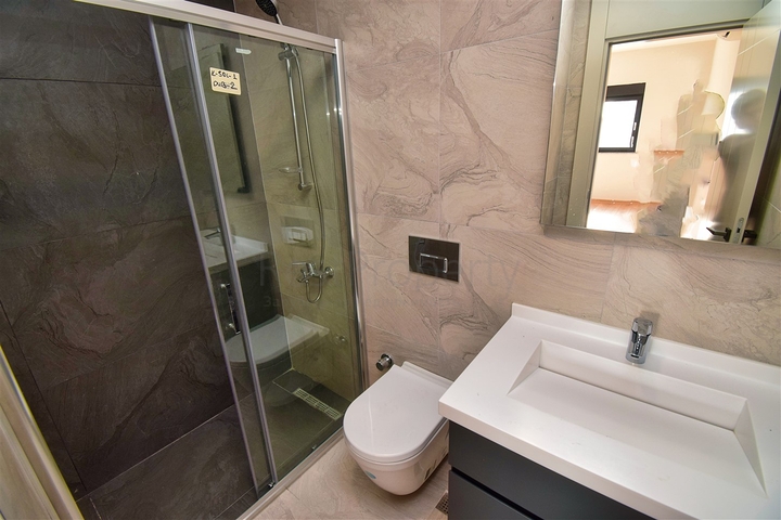 5+1 duplex apartment in Uncali - Antalya neighborhood