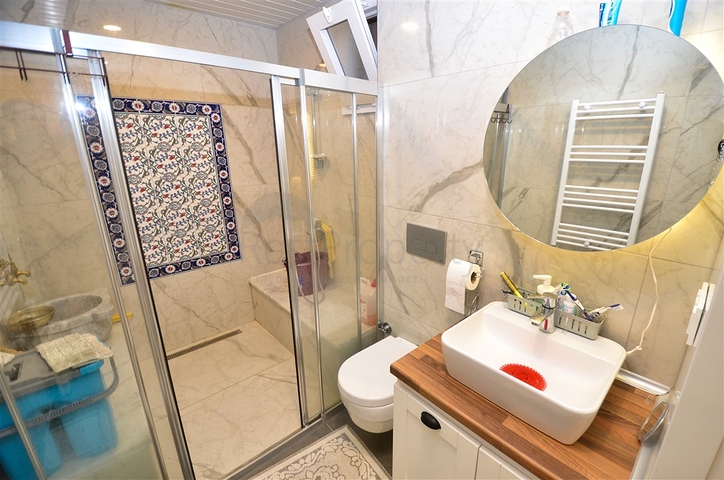 A 3+1 apartment in the Guzeloba - Antalya neighborhood 