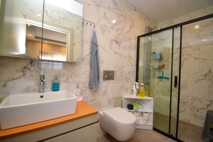 A 3+1 apartment in the Guzeloba - Antalya neighborhood