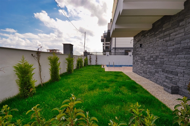 3+1 villas in the Guzeloba - Antalya neighborhood 