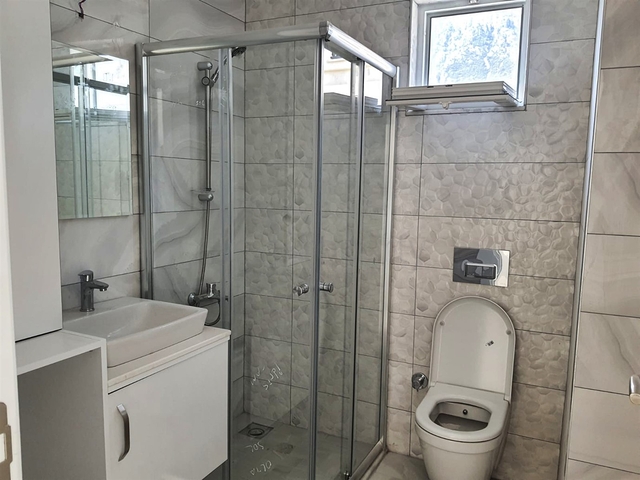 3+1 apartment in Aslanbujak - Antalya neighborhood 