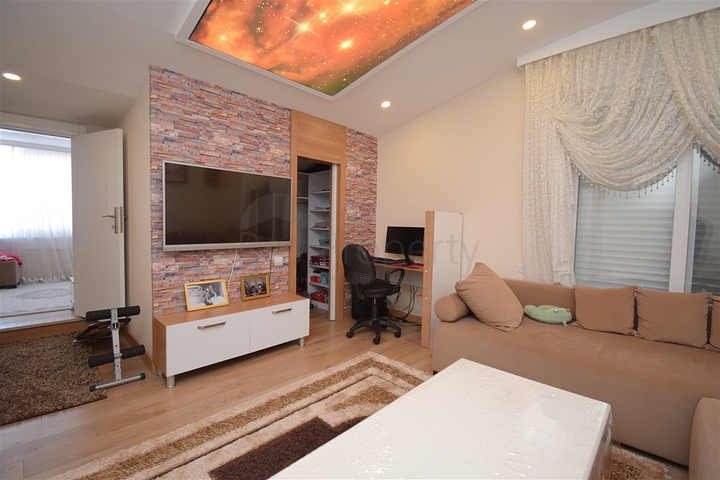 A 3+1 apartment in the Guzeloba - Antalya neighborhood 