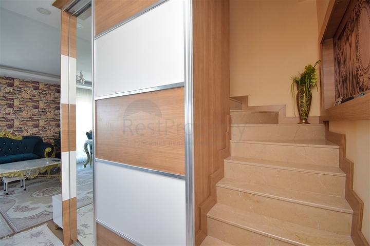 A 3+1 apartment in the Guzeloba - Antalya neighborhood 