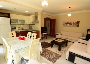 Apartments with access to the garden in the complex on the first line