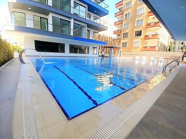 1+1 apartment for rent on the first coastline in Mahmutlar