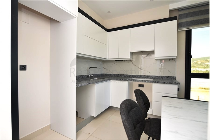 1+1 apartment 200 m from the beach in Kargicak district 