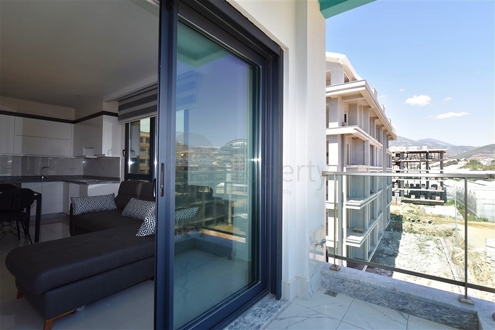 1+1 apartment 200 m from the beach in Kargicak district 