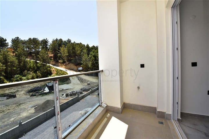 1+1 apartment in a new complex in Avsalar district