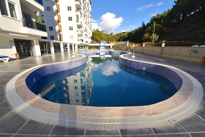 1+1 apartment in a new complex in Avsalar district