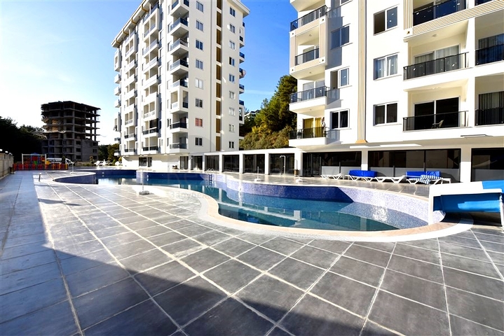 1+1 apartment in a new complex in Avsalar district