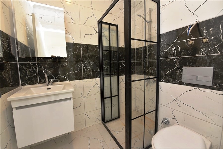 1+1 apartment in a new complex in Avsalar district