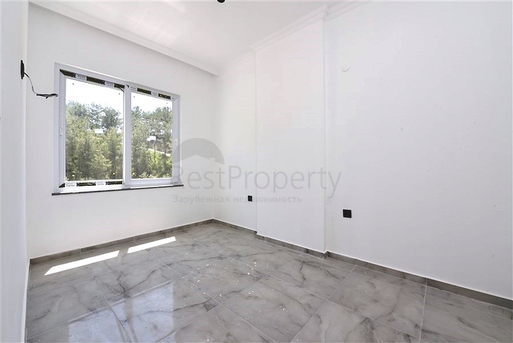 1+1 apartment in a new complex in Avsalar district