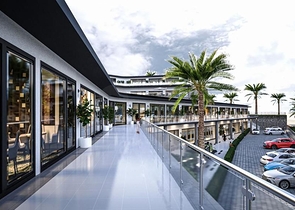 An ideal apartment complex surrounded by lush greenery.