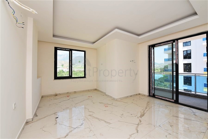 One-bedroom apartment with panoramic mountain views in the Mahmutlar area