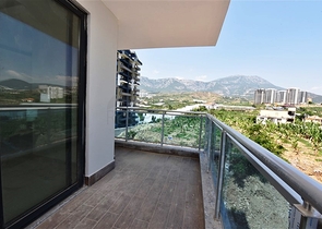 One-bedroom apartment with panoramic mountain views in the Mahmutlar area