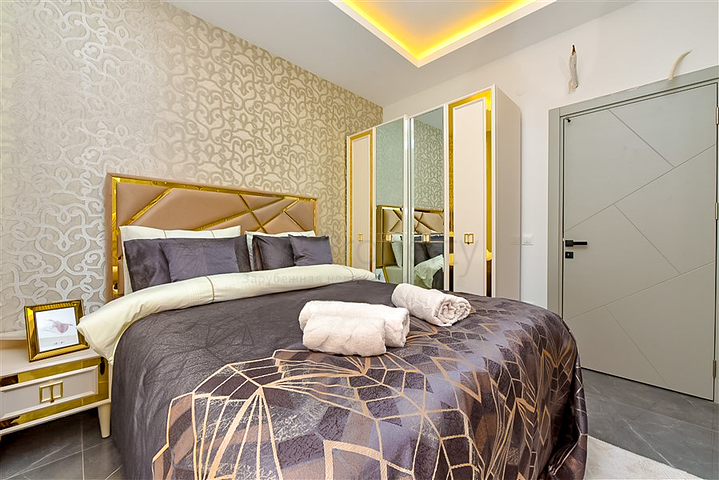 Buy Property in Alanya - 1 bedroom apt - under construction - Oba / Alanya 