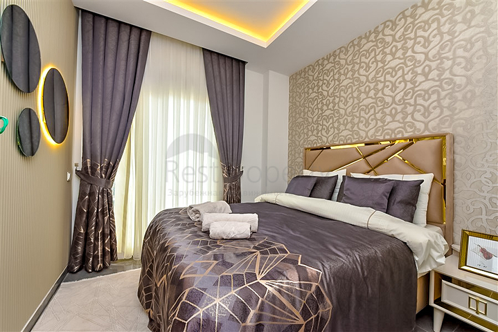 Buy Property in Alanya - 1 bedroom apt - under construction - Oba / Alanya 