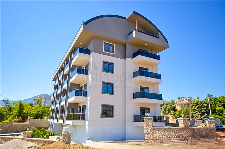 Buy Property in Alanya - 1 bedroom apt - under construction - Oba / Alanya 