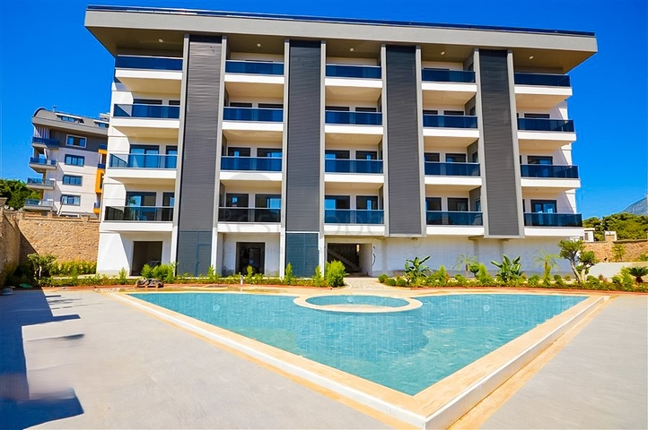 Buy Property in Alanya - 1 bedroom apt - under construction - Oba / Alanya 