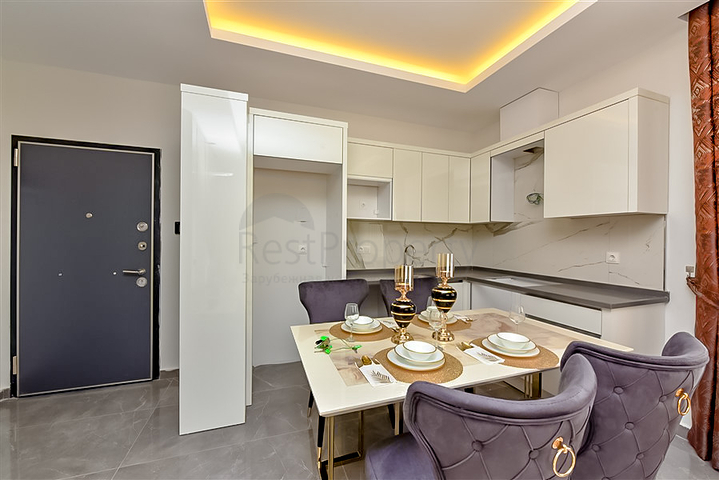 Buy Property in Alanya - 1 bedroom apt - under construction - Oba / Alanya 