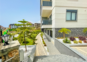 Buy Property in Alanya - 1 bedroom apt - under construction - Oba / Alanya 