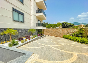 Buy Property in Alanya - 1 bedroom apt - under construction - Oba / Alanya 