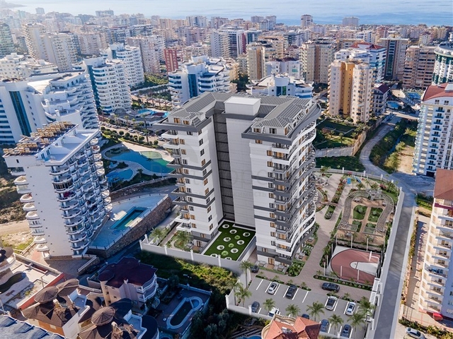 1+1 apartment in a premium class complex under construction in Mahmutlar district