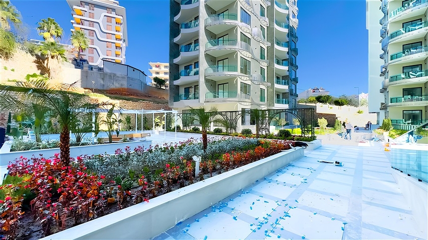 Modern 1+1 Apartment in Tosmur – Partial Sea View & Full Facilities