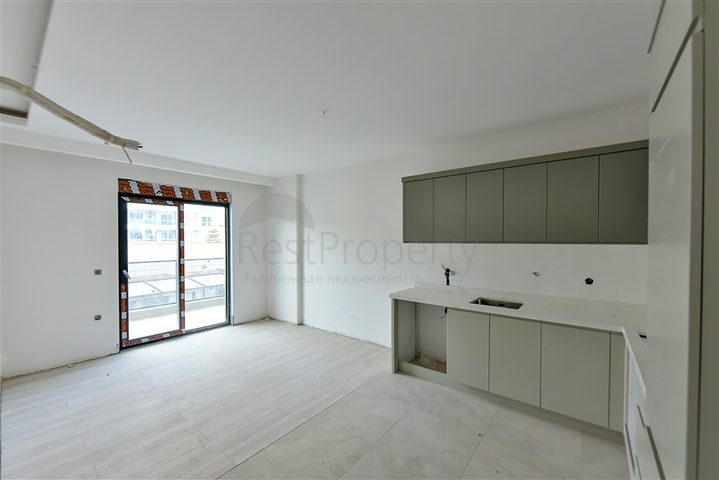 Apartment in a new complex in the heart of Mahmutlar