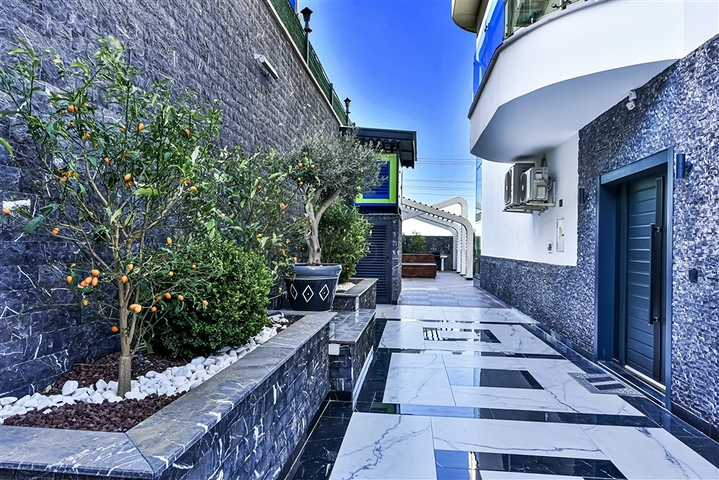 Villa 6+1 with sea view in Kargicak area 