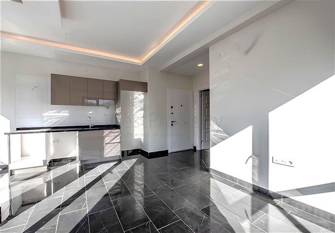 1+1 apartment in a new residential complex in Mahmutlar district at a bargain price 