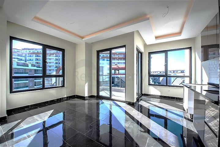 1+1 apartment in a new residential complex in Mahmutlar district at a bargain price 