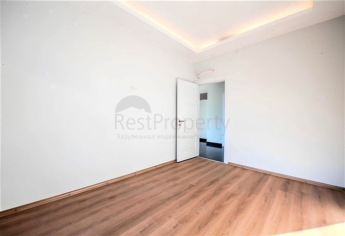 1+1 apartment in a new residential complex in Mahmutlar district at a bargain price 