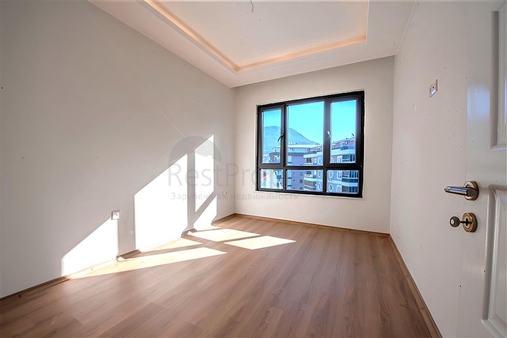 1+1 apartment in a new residential complex in Mahmutlar district at a bargain price 