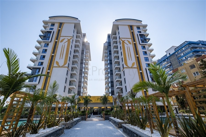 Beachfront 1+1 Apartment in Mahmutlar, Alanya – Private Beach Access