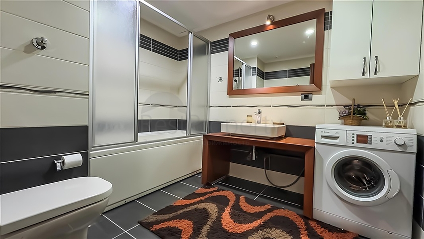 Sea-Front 3+1 Apartment in Central Alanya with Private Beach Access