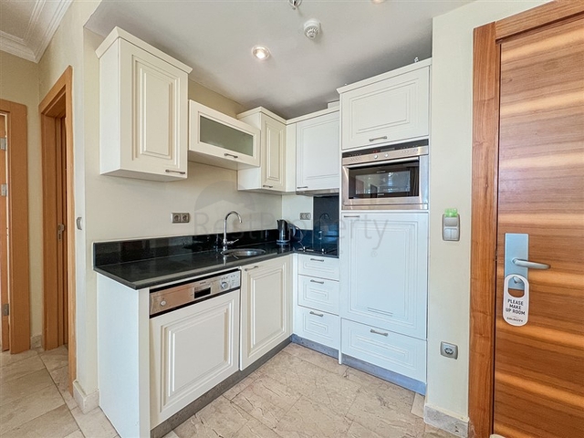 2+1 apartment in a house with hotel infrastructure in Kargicak district