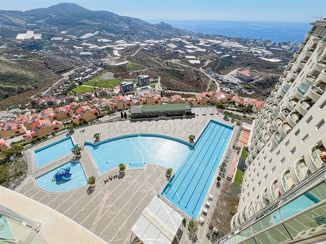 2+1 apartment in a house with hotel infrastructure in Kargicak district