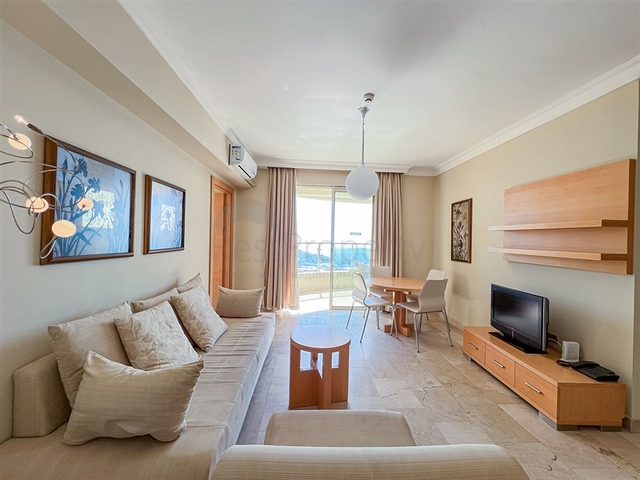 2+1 apartment in a house with hotel infrastructure in Kargicak district