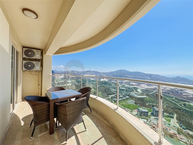 2+1 apartment in a house with hotel infrastructure in Kargicak district