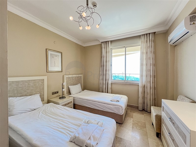 2+1 apartment in a house with hotel infrastructure in Kargicak district