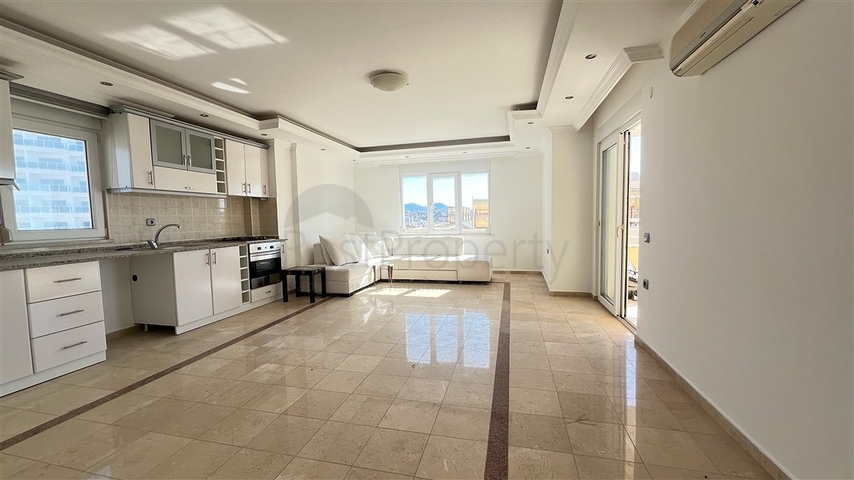 Sea-Front 2+1 Apartment in Tosmur, Alanya with Direct Beach Access